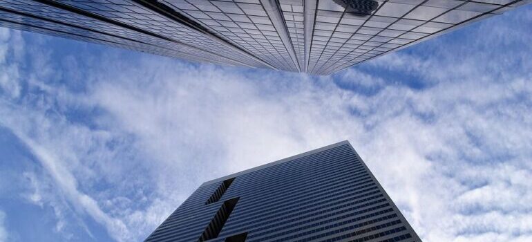 Business building reaching for the sky - climb to the top with good online reputation management.