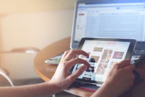Person exploring optimized content on iPad
