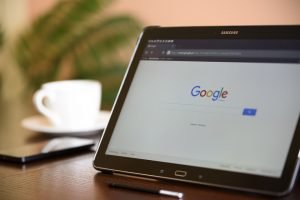 Google search page on laptop screen.