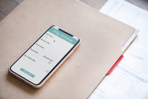 Phone with Pay Invoice option.