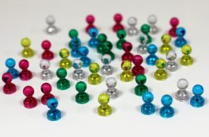 Pawns in different colors.