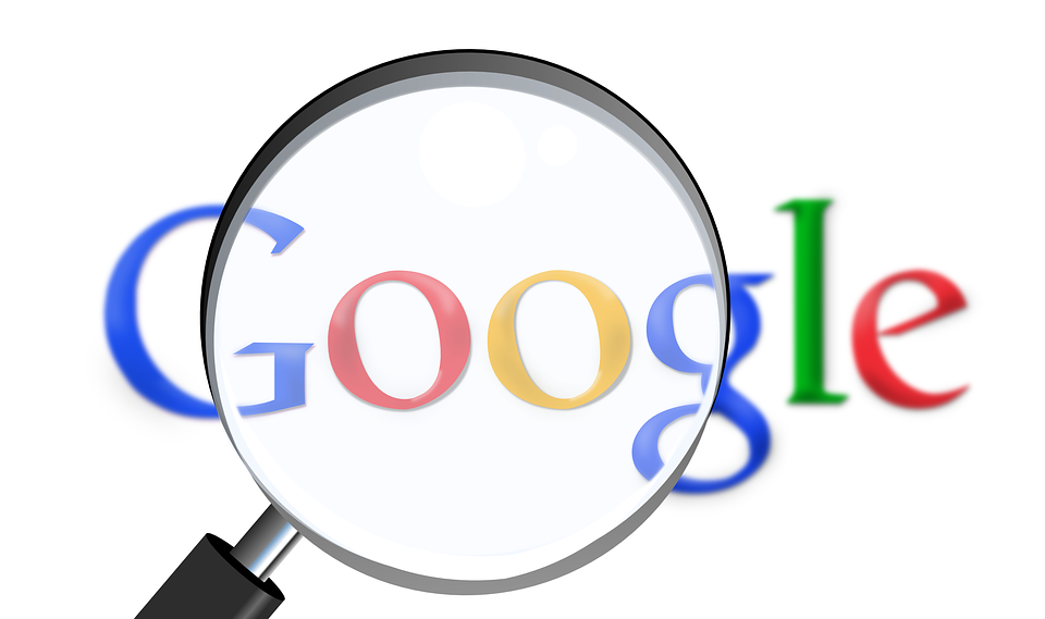 a view of the Google logo through a magnifying glass