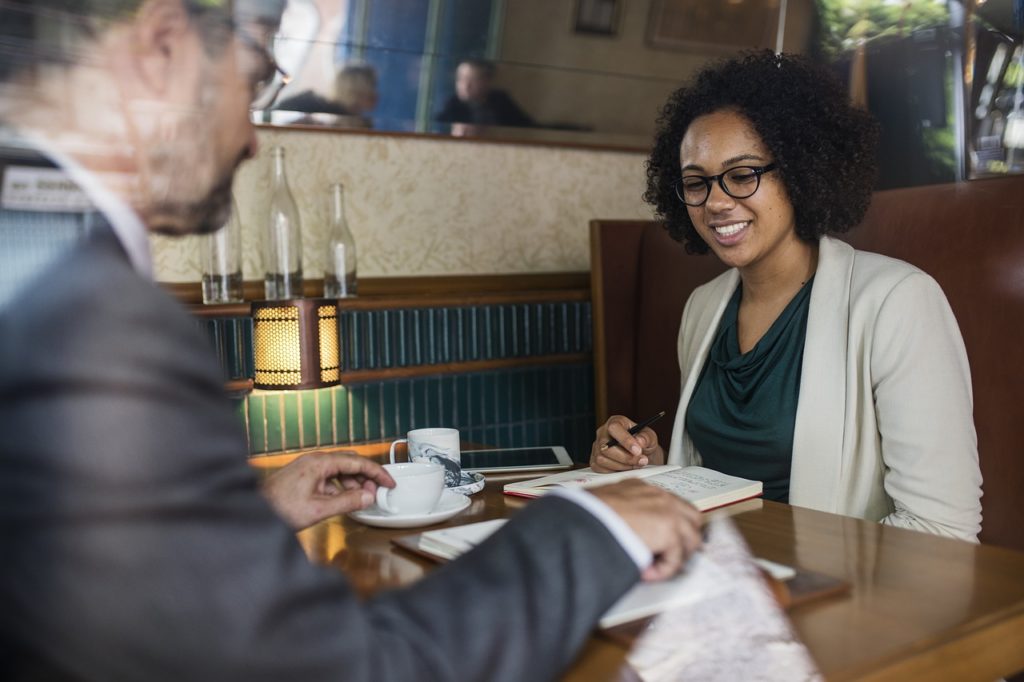 Two people, having a business lunch.