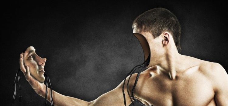 A cybernetic person looking at his own face