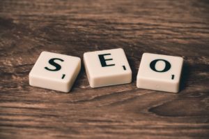 Three cubes, together forming the word "SEO".