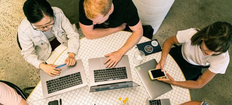 Group of people exploring SEO competitive analysis