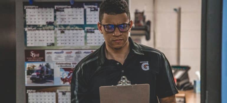 man holding clipboard