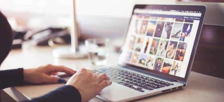 Person looking through high-quality images - reduce the bounce rate on your website