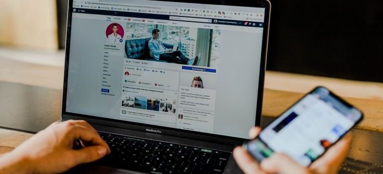 Person looking at a Facebook profile