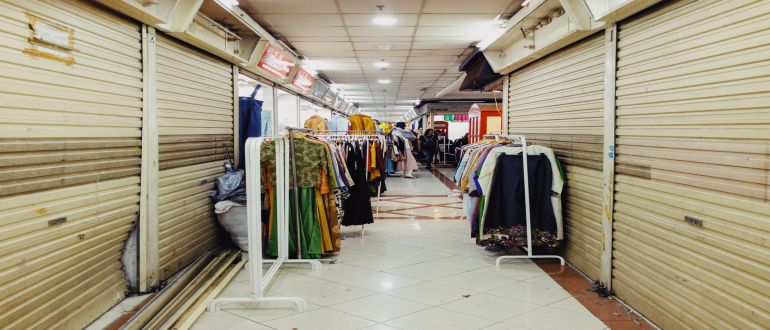 Clothes in storage areas.