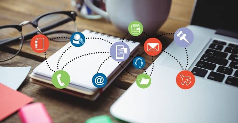 Different email icons with a laptop background