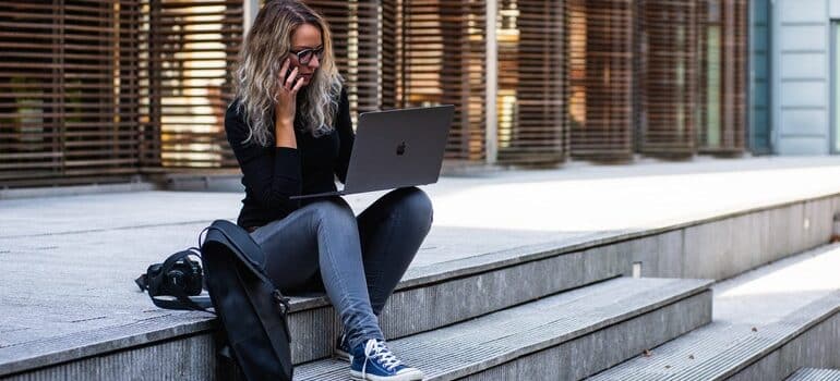 Young person using their laptop.
