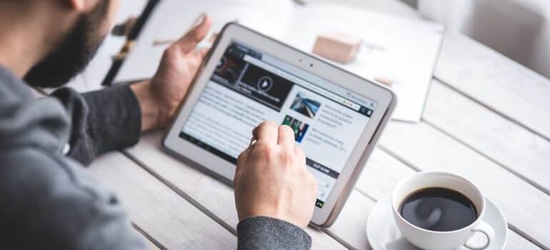 Person reading about choosing topics for your blog.
