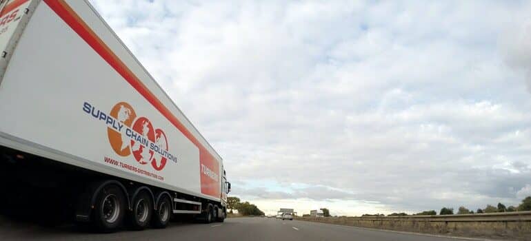 Moving truck on the road.