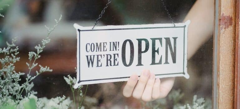 "open" sign on a door.