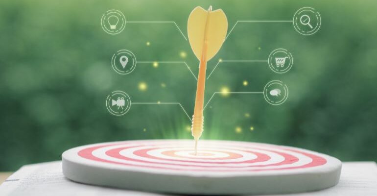 A dart stuck in the center of a target, with optimization icons coming from it.