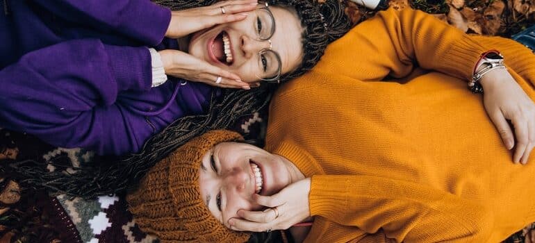 Two people happy about the benefits of user-generated content.