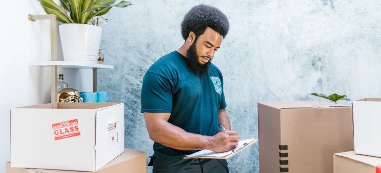 A mover doing an in-home estimate