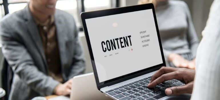 CONTENT on laptop screen.