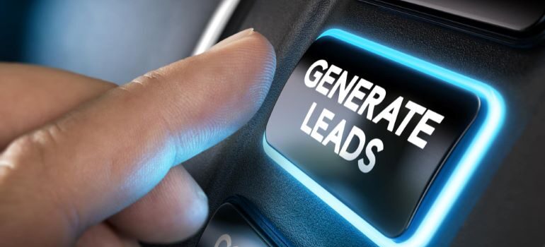 Person pressing a GENERATE LEADS button.