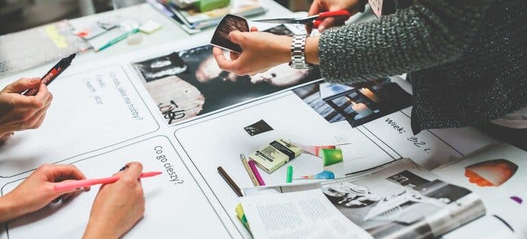 A team of people in an office planning off-page SEO tactics for movers.
