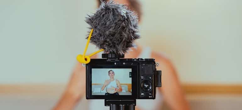 Person recording themselves for social media.