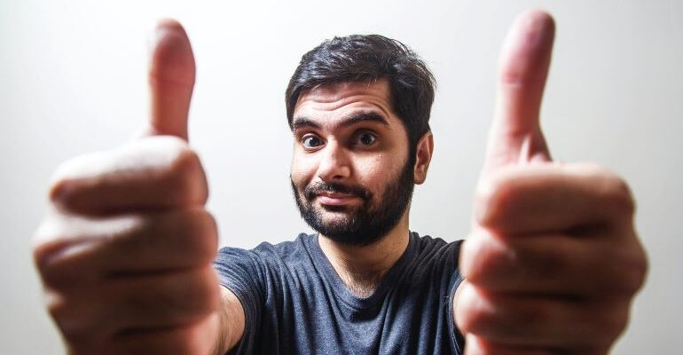 Man showing thumbs up.