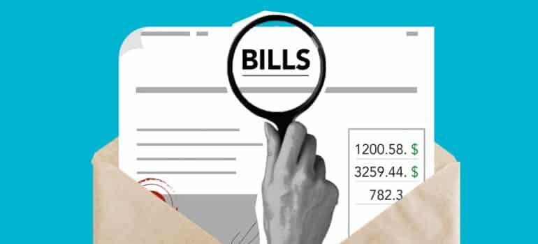 Cutout paper of man examining bills to see the increase in moving costs