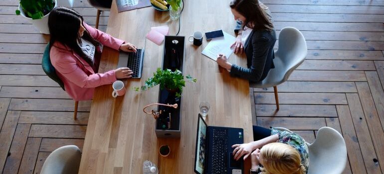 three women producing content 