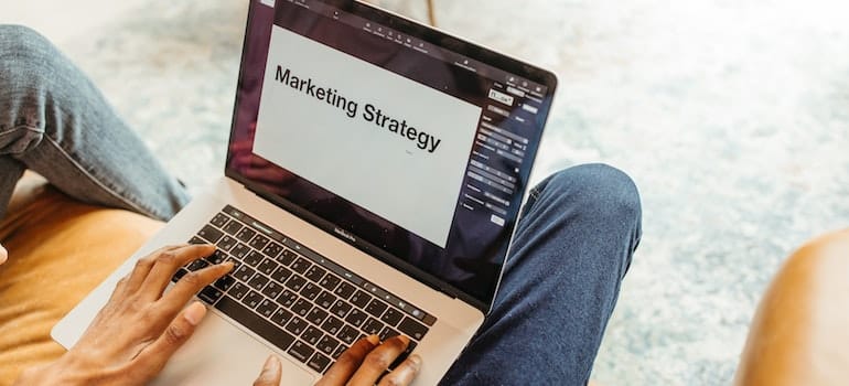 a group of people preparing for a busy moving season with digital marketing