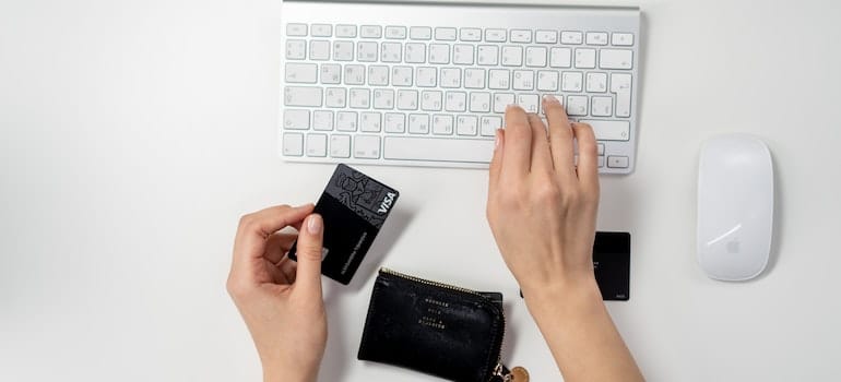 Person paying for an online purchase.