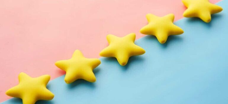 Five stars on a blue and pink surface