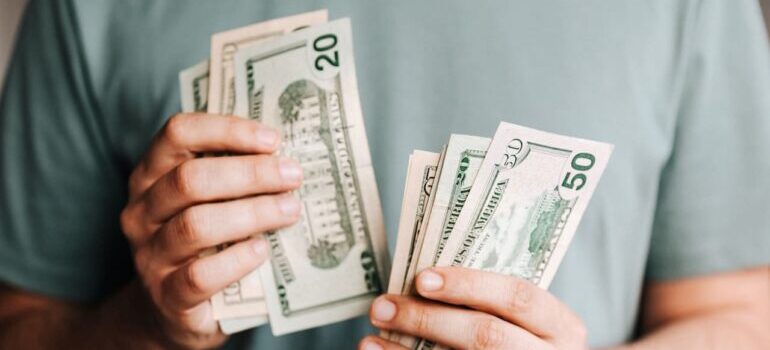 man counting money