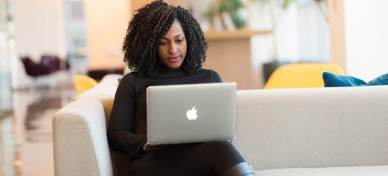 A woman working on her laptop