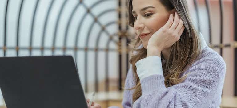 A person reading their email