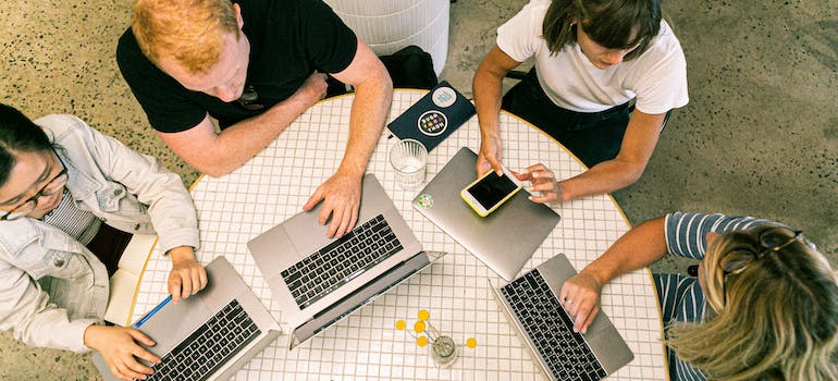 A digital marketing team having a meeting about SEO content traps