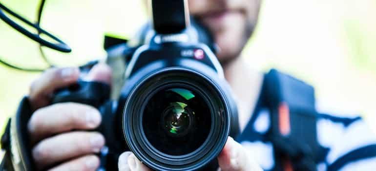 A camera person creating video content, which is one of the most significant 2024 SEO trends movers