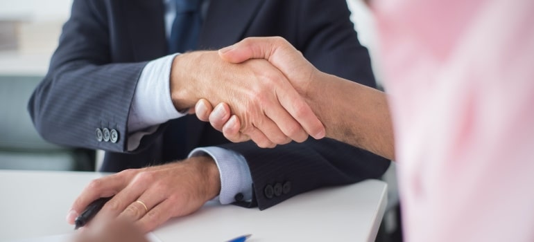 Two people shaking hands 