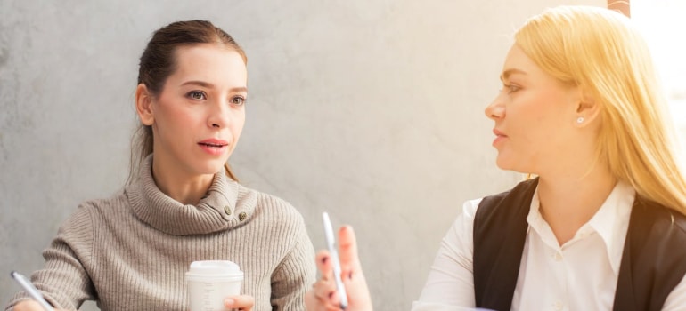 two people discussing something