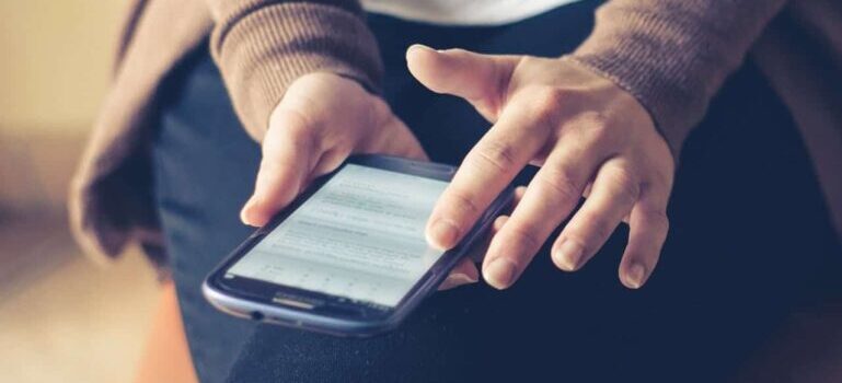 person holding a mobile phone