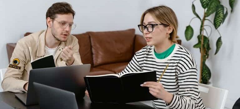 two people discussing marketing strategies for their family-run business