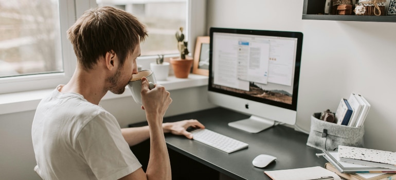 man using a computer researching reasons for Google Business Profile suspensions