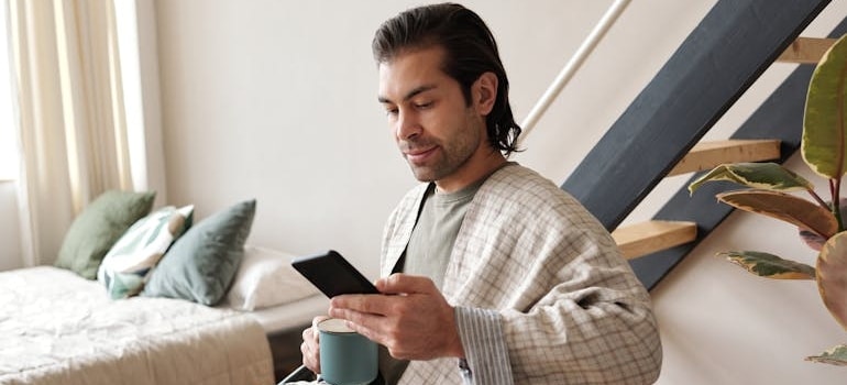 A person reading about the biggest challenges for moving companies