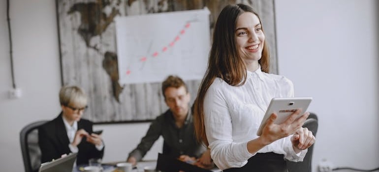 A person feeling optimistic after conducting a marketing agency evaluation for moving companies